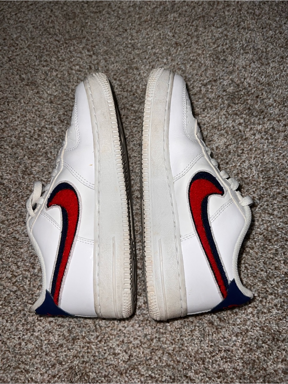 Nike White Sneakers with Red & Navy Swoosh Accents